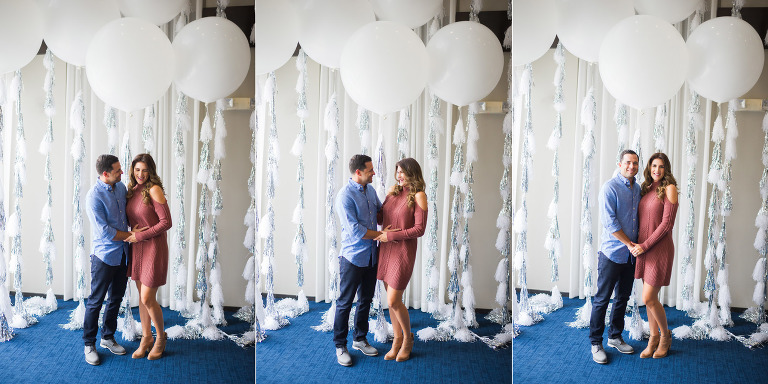 Fun posing with husband and soon to be mother at gender reveal party.